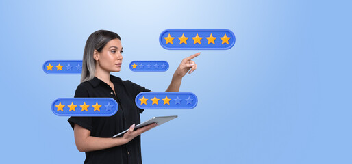 Poster - Woman interacting with digital star ratings while holding a tabl