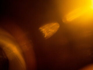 Wall Mural - abstract bokeh background with warm color. digital background for design. lens flare and light glow.