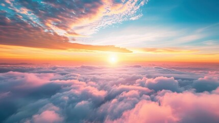 Wall Mural - a stunning sunset paints the sky with warm hues, casting a serene glow over a blanket of soft clouds