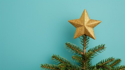 Wall Mural - christmas tree topped with a golden star.