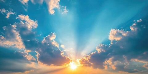 Poster - The sun sets, revealing a striking blue sky and clouds.