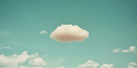 Aufkleber - A solitary cloud against a blue sky backdrop.