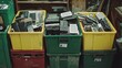 © Sawitri - Colorful bins filled with electronic waste ready for organized recycling. This image highlights the importance of proper disposal and sustainable practices.