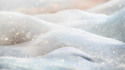 Poster - Delicate white fabric draped gracefully, shimmering with fine glitter particles, creating an elegant and dreamy visual effect.