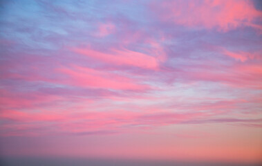 Wall Mural - utterly spectacular sunset with colorful clouds lit by the sun.
