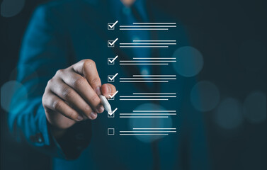 Poster - Businessman use pen to virtual tick correct sign mark for project and document approval, Quality and ISO concept.