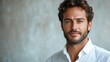 © Chandlerlikes - Full-length portrait of a confident businessman in a white shirt, isolated against a white background.