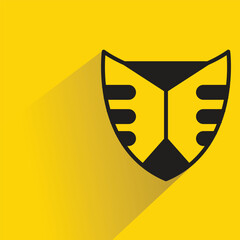 Poster - shield badge with shadow on yellow background