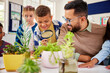 © Rido - Children during science lesson learning about plant growth
