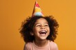 © Rawpixel.com - Party hat laughing portrait child.