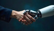 © StockLab - Man hand holding a robot ai hand while sealing the deal with their hands