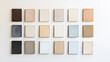 © LouLou - Selection of neutral paint swatches arranged in a grid on a clean white background, showcasing a range of soft, muted colors for design inspiration