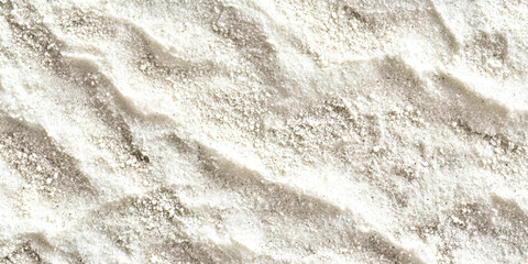 Poster - A white sandy beach with a few rocks scattered around