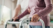 © Clement C/peopleimages.com - Walker, physiotherapy and hands of old person in office for healthcare, osteoporosis or rehabilitation. Medical, helping and support with closeup of senior patient and doctor for healing and walking