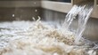 © A Denny Syahputra - Shredded paper is combined with water and chemicals in a pulping machine for recycling