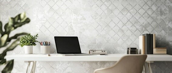 Poster - Minimalist modern home office desk with a laptop, and stationery on a white table against a wall with patterned wallpaper