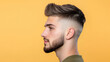© Alice a. - Man with undercut hairstyle featuring shaved sides and stylish top, showcasing modern look against vibrant yellow background