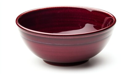 Red ceramic bowl with a glossy finish, isolated on a white background.