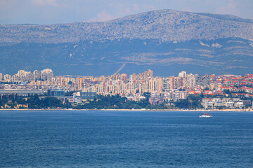 Wall Mural - Contemporary buildings, gardens and beaches at the waterfront in Split, Croatia. View of Split from the boat.