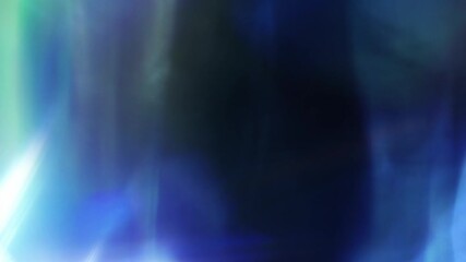 Wall Mural - blue lights flowing in the breeze 4k loop features an abstract video of multicolored blue lights flo