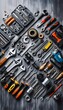 © organik - Different auto mechanic's tools on grey table, flat lay