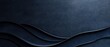 © artbot - Abstract dark blue background with flowing wave patterns.