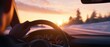 © Priya - driving into a sunset with a scenic winter landscape