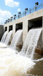 © wasan - Water flows through a dam, showcasing engineering and environmental interaction.