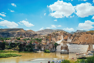 Wall Mural - Hasankeyf village. View of the ruins of the Old Bridge from the Castle on the Tigris River. Batman, Turkey.