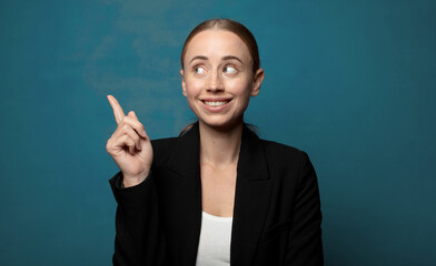 Wall Mural - smiling happily and looking sideways, wondering, thinking or having an idea