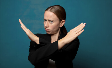 Wall Mural - looking annoyed and sick of your attitude, saying enough! hands crossed up front, telling you to sto