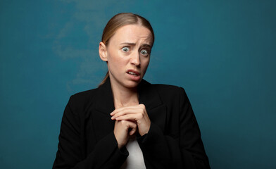 Wall Mural - looking worried, stressed, anxious and scared, panicking and clenching teeth