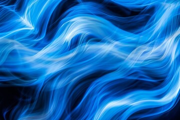 Poster - Dynamic blue waves moving gracefully against a dark backdrop, creating an abstract and captivating display of light and color