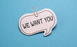 © Pawel - We Want You text on card isolated on blue background