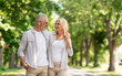 © Prostock-studio - Romantic Senior Couple Walking Outdoors In Summer Park And Embracing, Loving Happy Mature Spouses Hugging And Smiling To Each Other, Cheerful Husband And Wife Enjoying Outside Walk, Copy Space