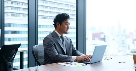 Aufkleber - Japanese businessman, laptop and typing for email. communication or report as accountant in company. Male person, technology and working with research, networking and proposal for financial planning