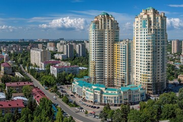 Poster - Aerial view of modern skyscrapers surrounded by greenery and urban landscape.