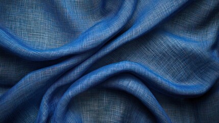 Leinwandbilder - A close-up of soft, textured blue fabric, showcasing its draping and weave.