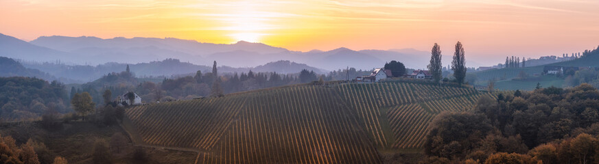 Wall Mural - aerial sunset panorama of the picturesque, autumn-covered hills near maribor, close to the austrian 