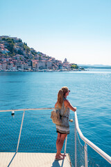 Wall Mural - Woman tourist in Croatia, beautiful village of Sibenik, Dalmatia. travel destination, tour tourism or weekend in Croatia