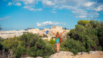 Wall Mural - happy woman in athens looking at panoramic view of parthenon acropolis. travel destination,vacation,