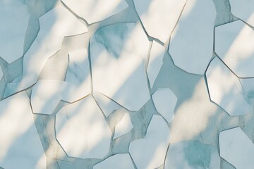 Poster - A textured surface of irregular marble-like tiles with soft shadows.