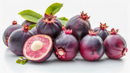 Wall Mural - Cluster of dark purple mangosteen fruits (Garcinia mangostana)   fruits with a white seed inside one, accompanied by green leaves