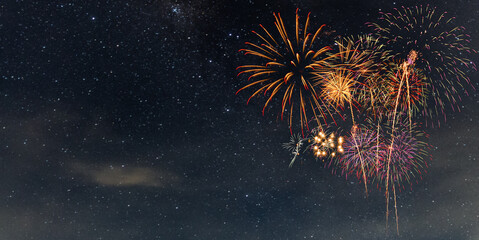 Wall Mural - fireworks with blur milky way background