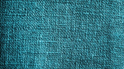 Poster - A close-up of textured turquoise fabric, showcasing its weave and color depth.