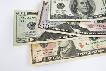 Wall Mural - Close-up of various dollar bills. American dollars. Business concept. Selective focus.