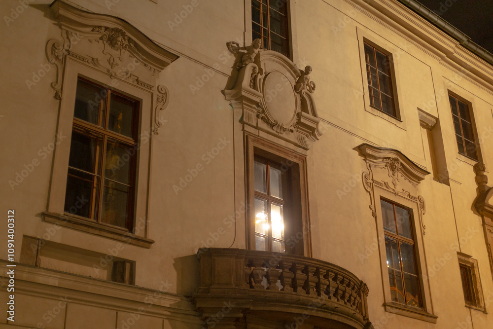 The stunning facade of a historic building showcases ornate windows and ...