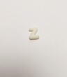 © khulisara - miniature cute handmade clay isolated sculpture english alphabet white Z