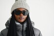 © Andrii  - Portrait of African American Woman in Winter Outfit