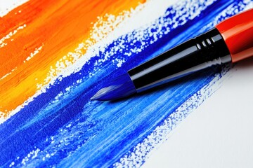 Poster - A close-up shot of a paint brush on a piece of paper, great for art-related concepts